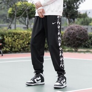 Nike Men's Black Joggers with White Accents
